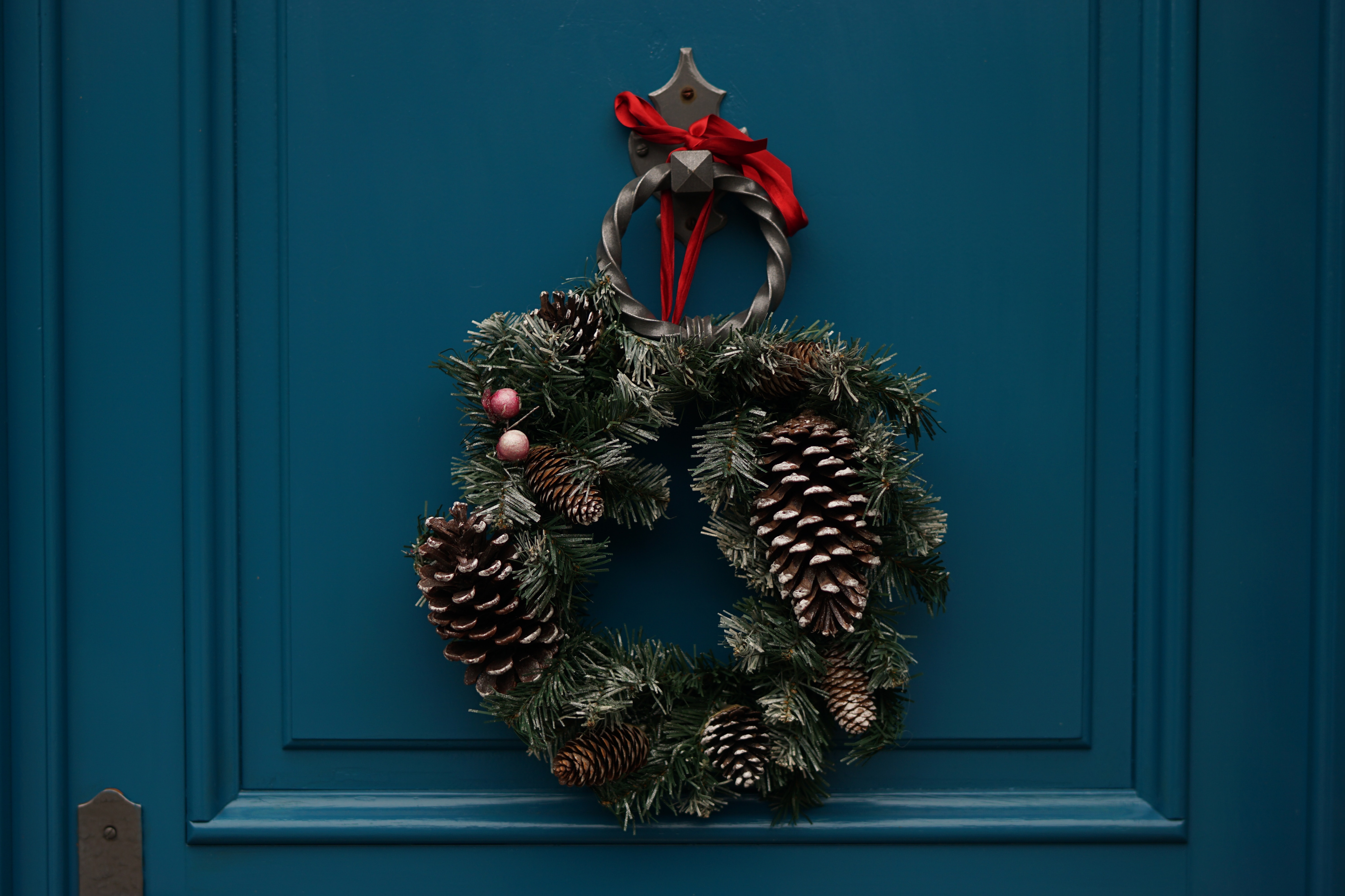 Christmas Wreath on turquoise door.